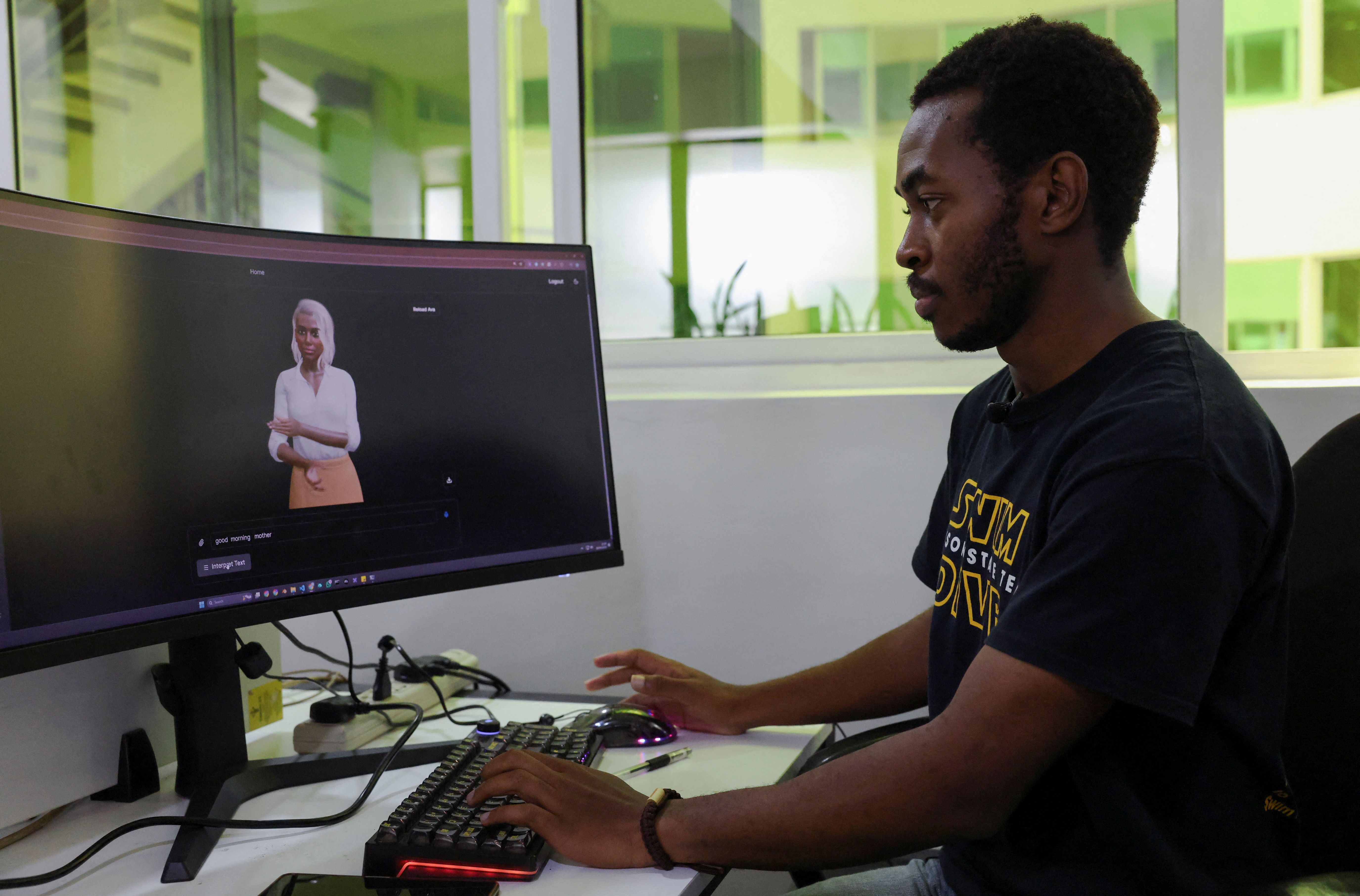 Signvrse data scientist Anthony Githinji works on an avatar, part of an AI-powered sign language translation technology designed to bridge communication gaps for deaf people, in Nairobi, Kenya.