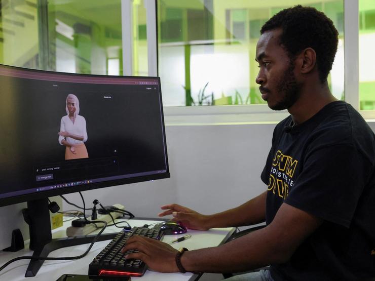 Signvrse data scientist Anthony Githinji works on an avatar, part of an AI-powered sign language translation technology designed to bridge communication gaps for deaf people, in Nairobi, Kenya.