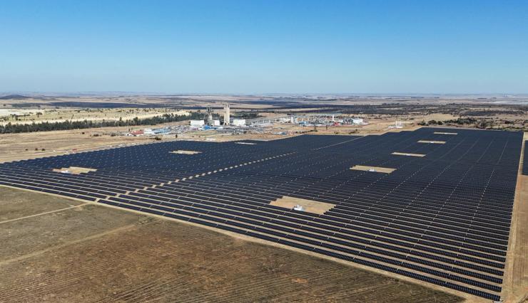 Solar panels in front of a mine in South Africa.
