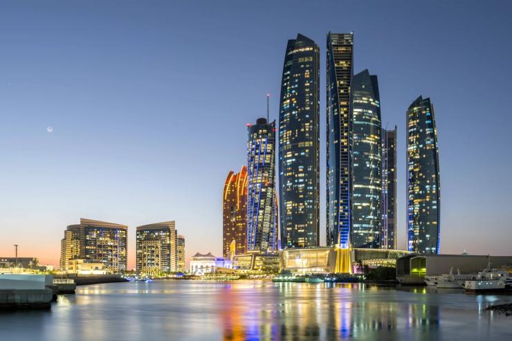 Abu Dhabi’s skyline at night.