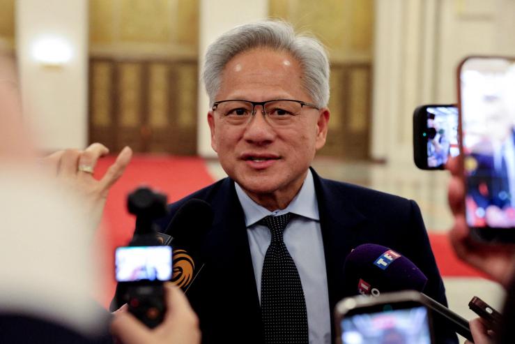 Nvidia CEO Jensen Huang speaks to the media on the day he attends a meeting between Chinese Premier Li Qiang