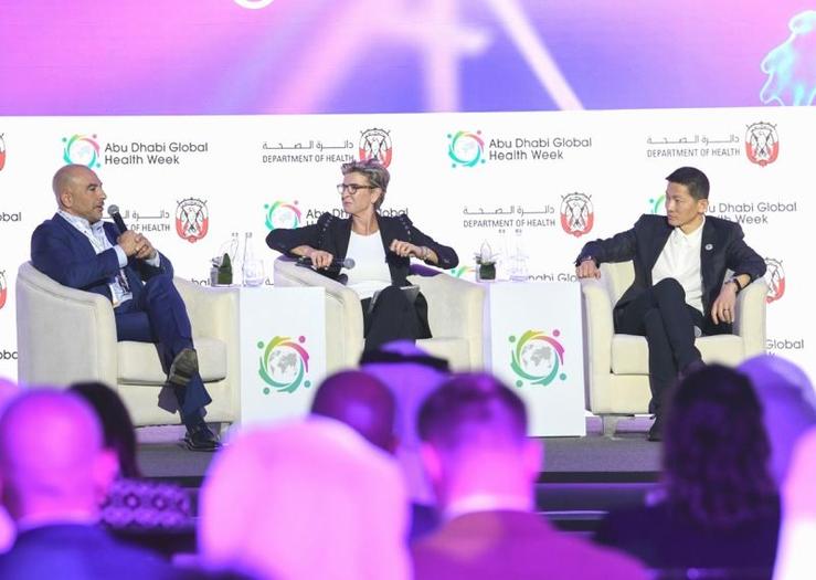 G42 CEO Peng Xiao, far right, onstage with longevity guru Peter Attia and CNN’s Becky Anderson during Abu Dhabi Global Health Week.