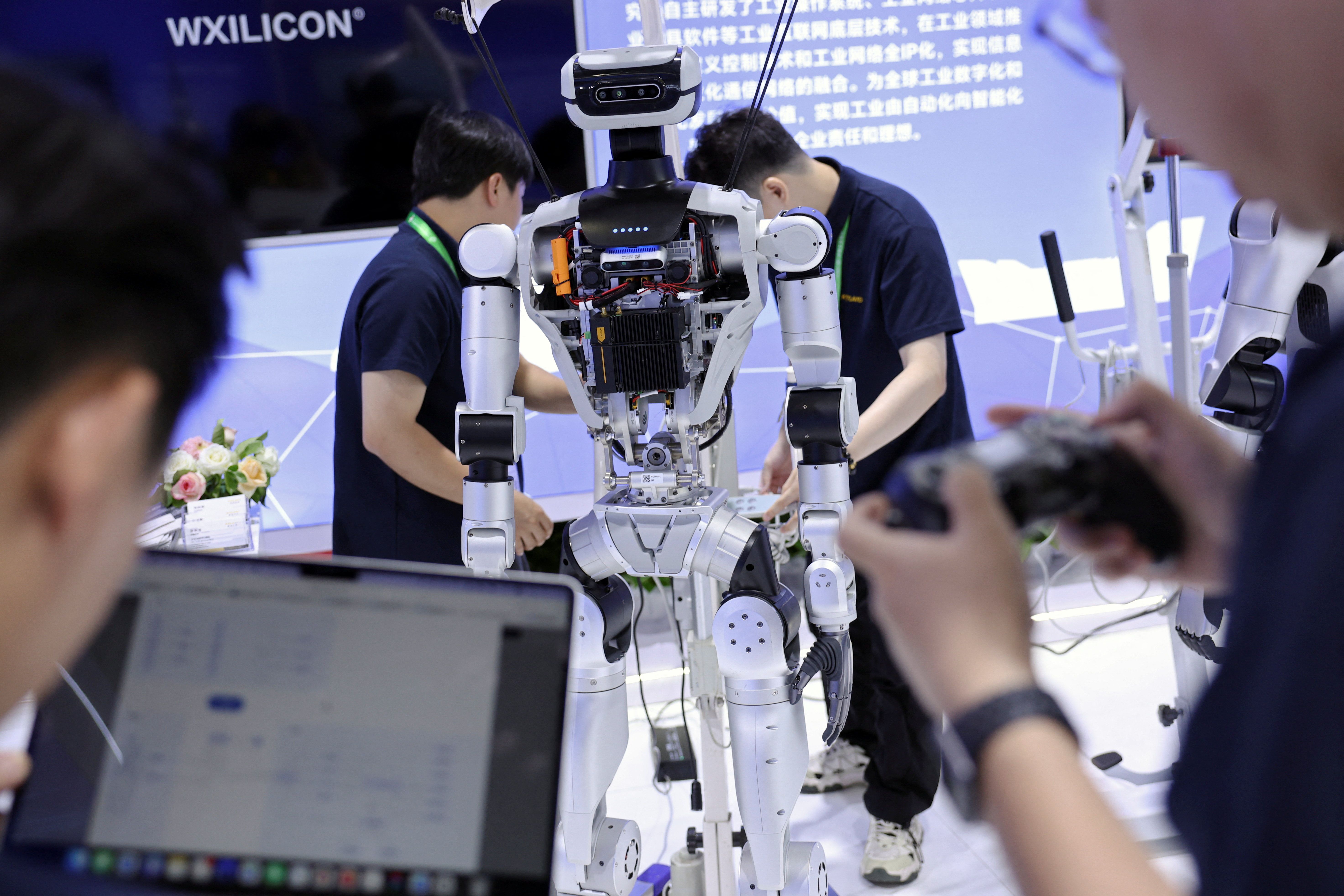 Humans control a humanoid robot