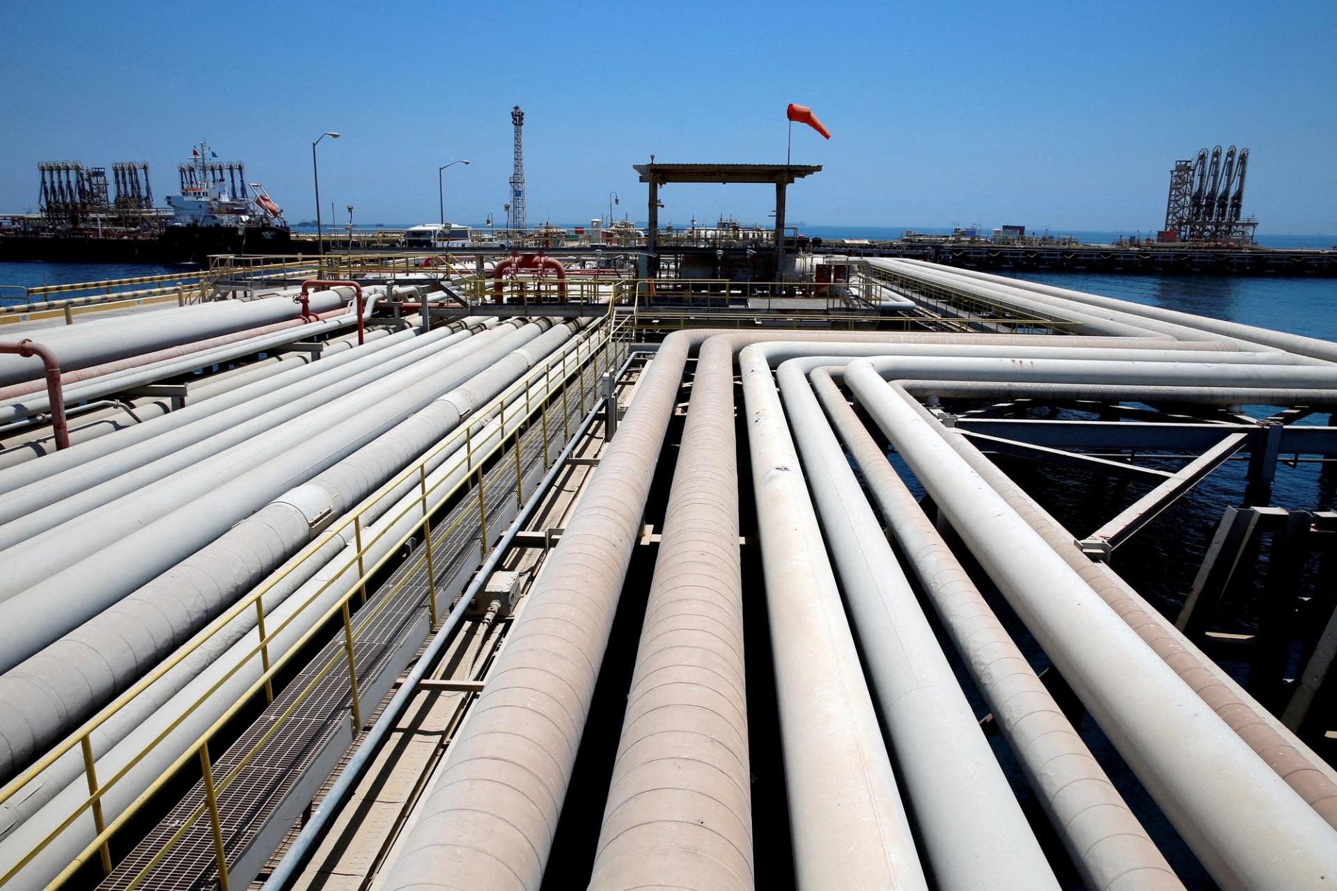 An oil tanker is being loaded at Saudi Aramco’s Ras Tanura oil refinery and oil terminal in Saudi Arabia.