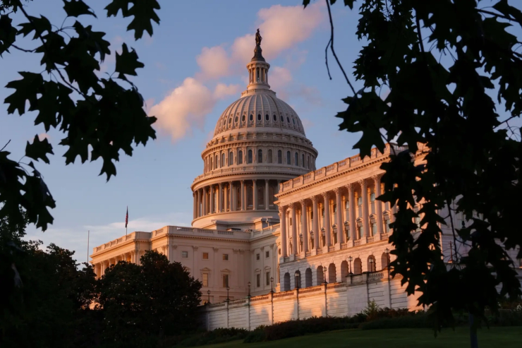 The US Capitol at sunset.