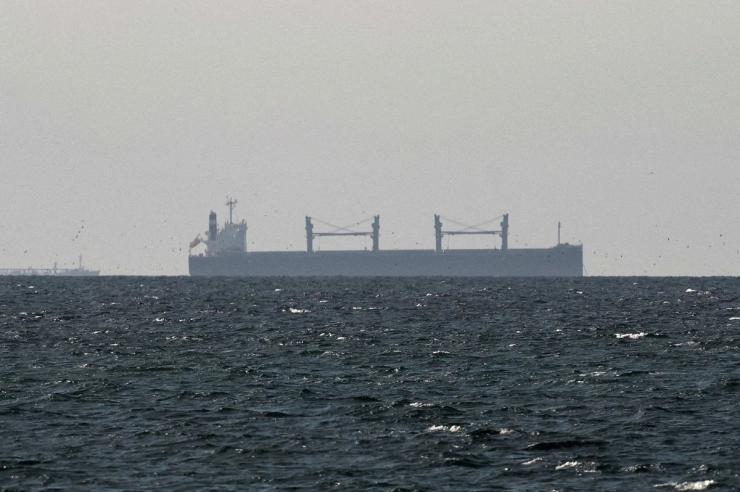 A tanker waits outside the Strait of Hormuz