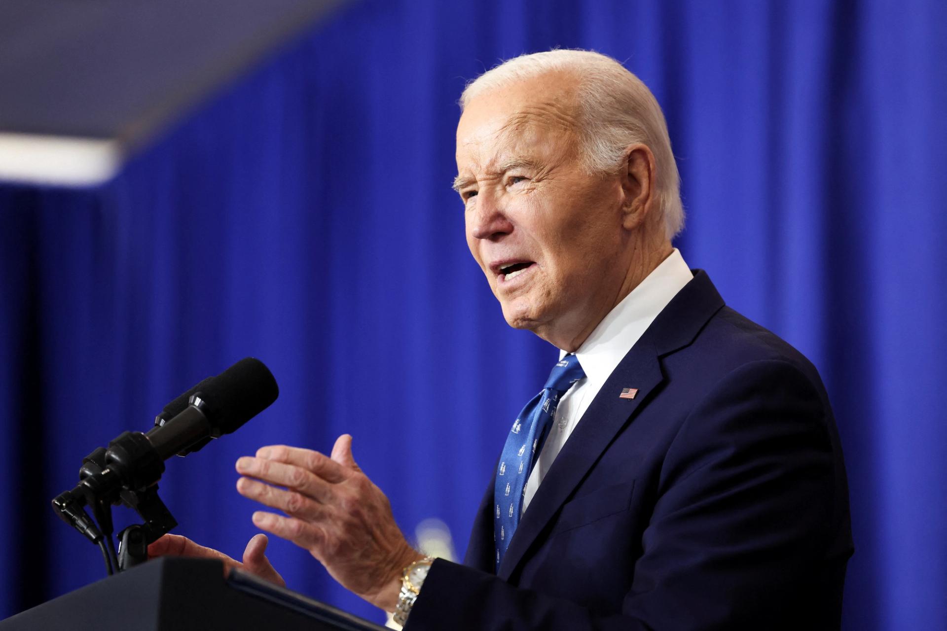 US President Joe Biden speaks as he visits the Department of Labor in December.