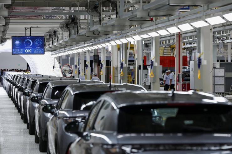 EV cars inside a BYD production facility.