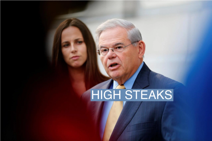 Senator Bob Menendez speaks to journalists after arriving to face trial for federal corruption charges as his daughter Alicia Menendez (L) looks on outside United States District Court for the District of New Jersey in Newark, New Jersey, U.S., September 6, 2017.