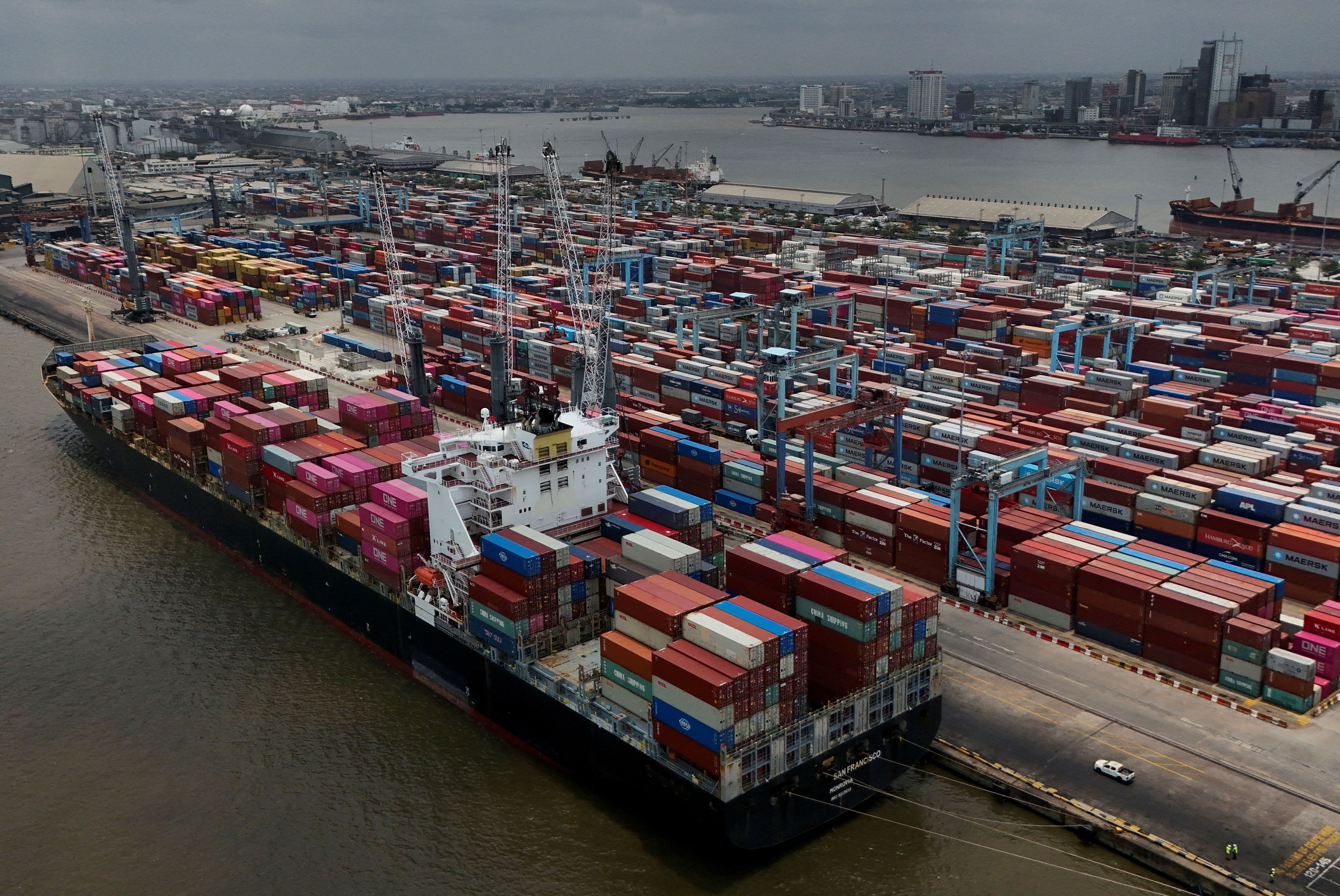 A container ship prepares to offload cargo in Nigeria.
