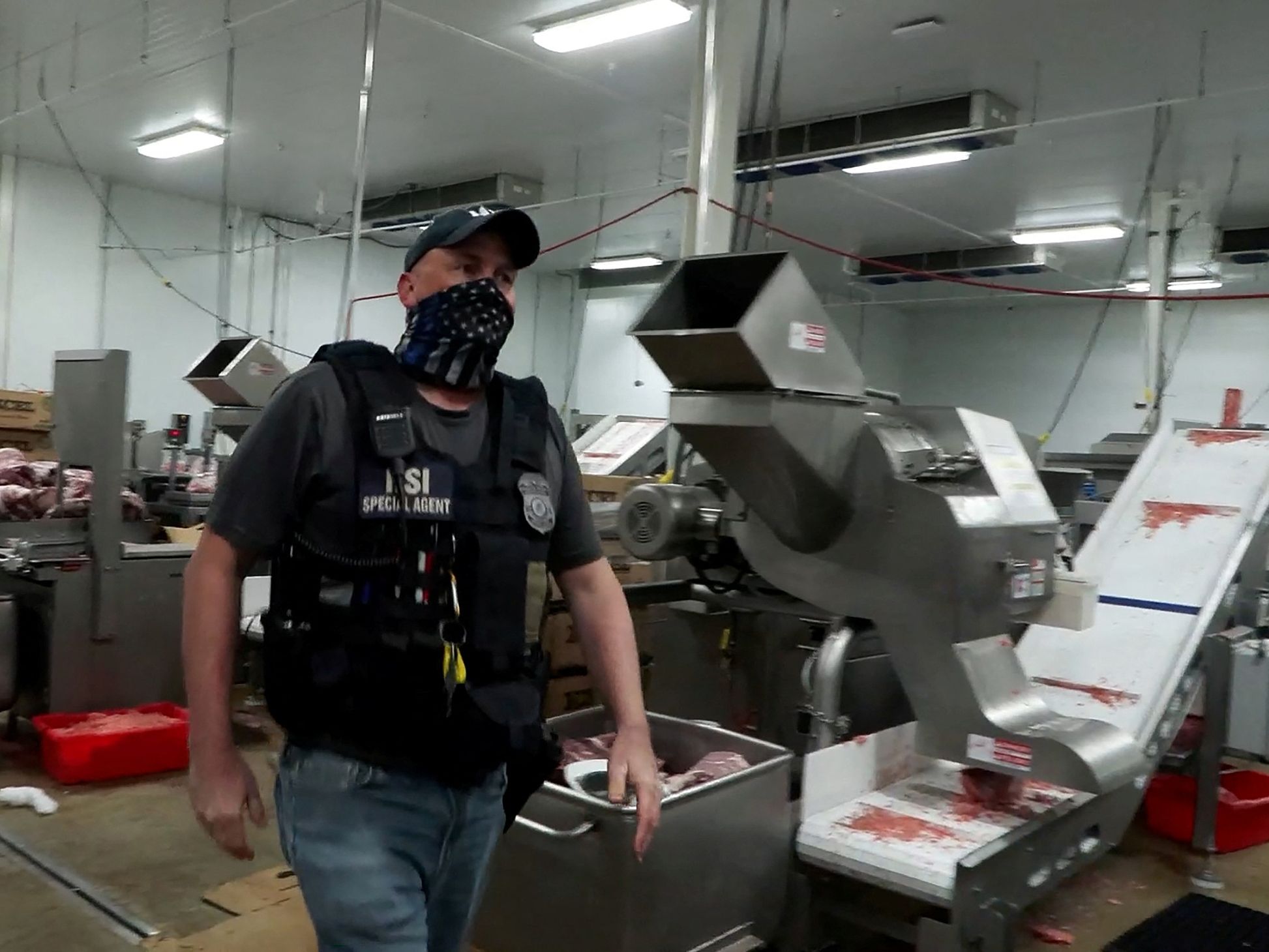 An agent during the recent raid on Glenn Valley Foods in Nebraska