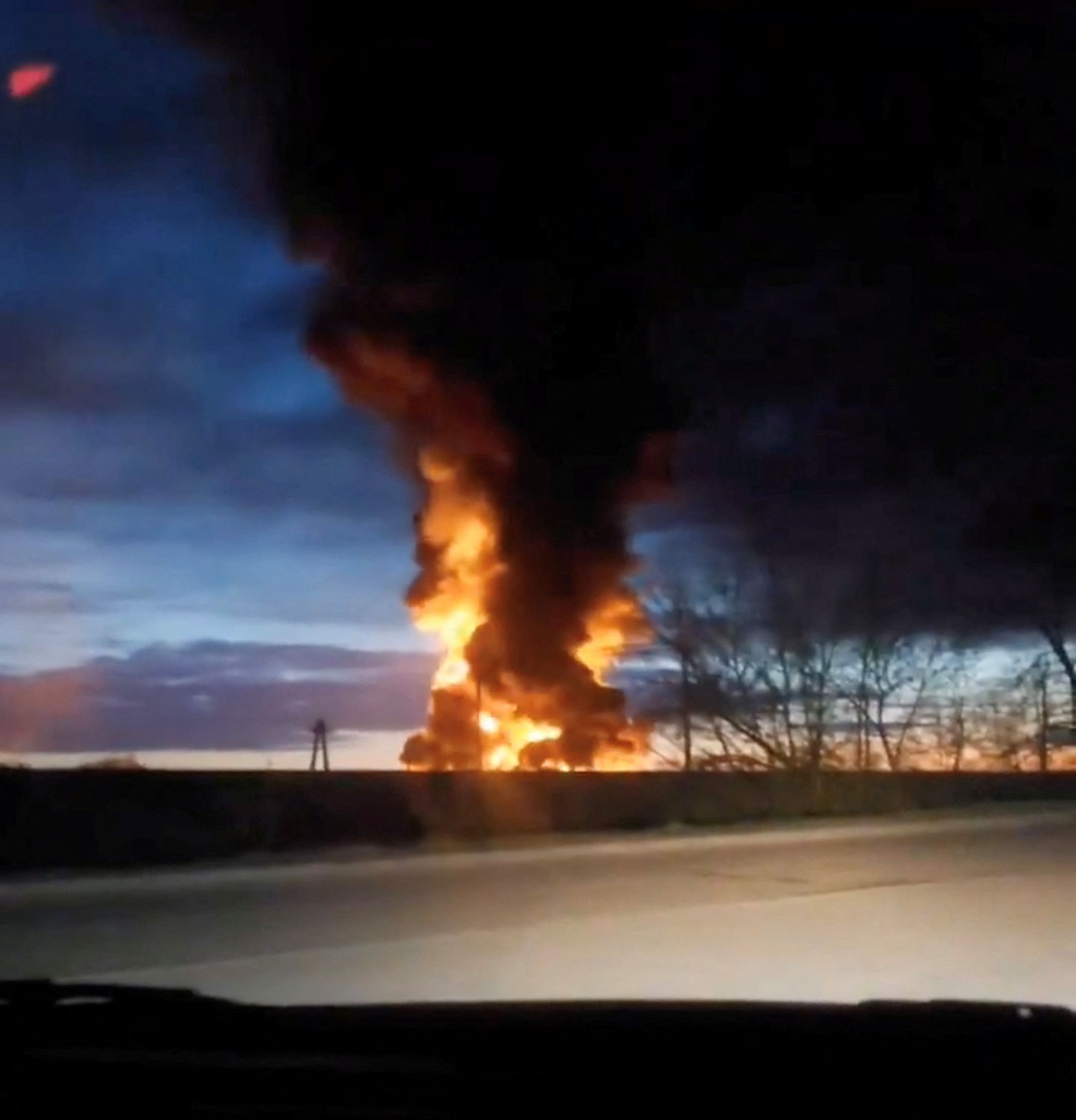 A fire at an energy facility after a Ukrainian drone attack in Yartsevo, Russia.