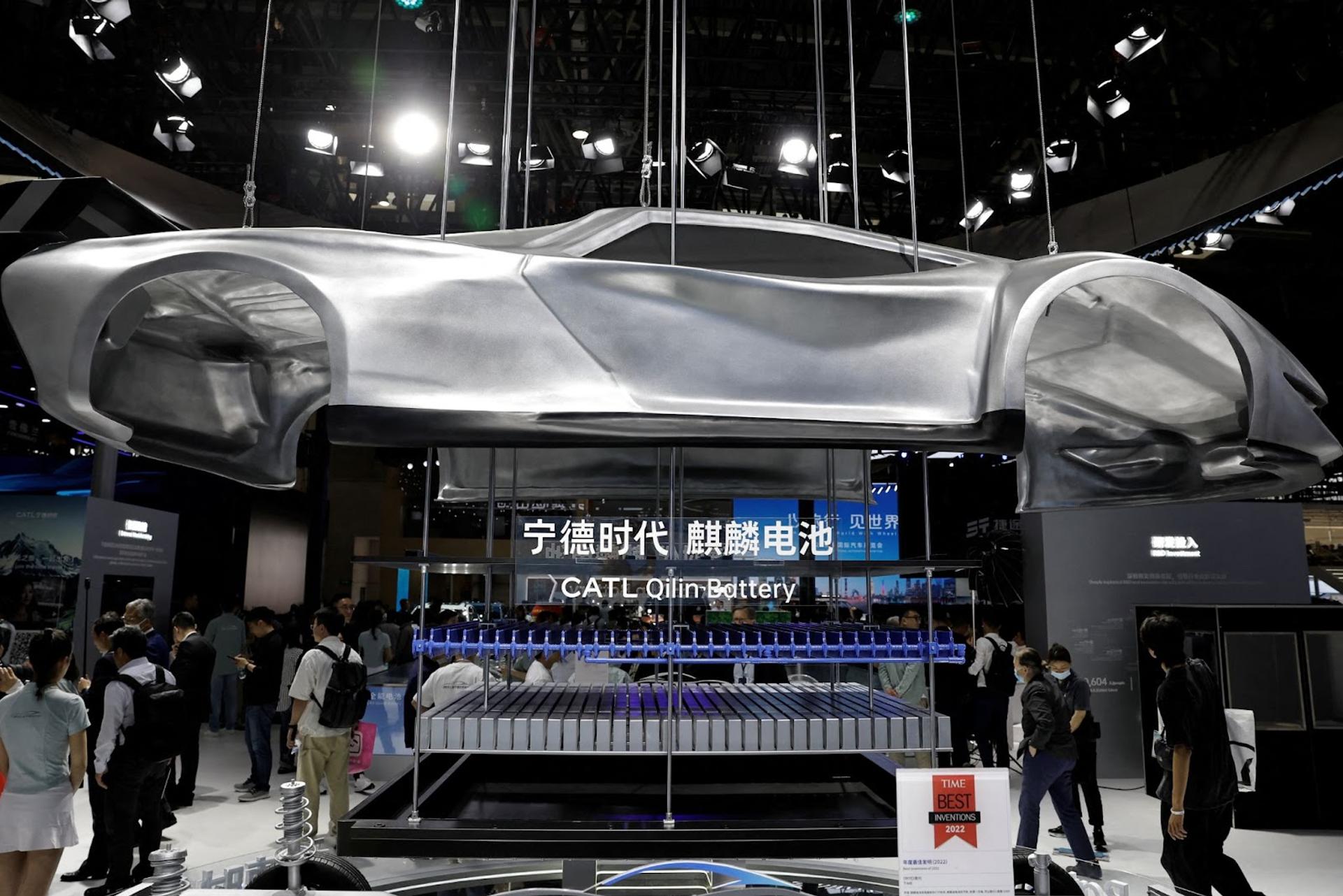 People visit the booth of battery manufacturer CATL at the Beijing International Automotive Exhibition.