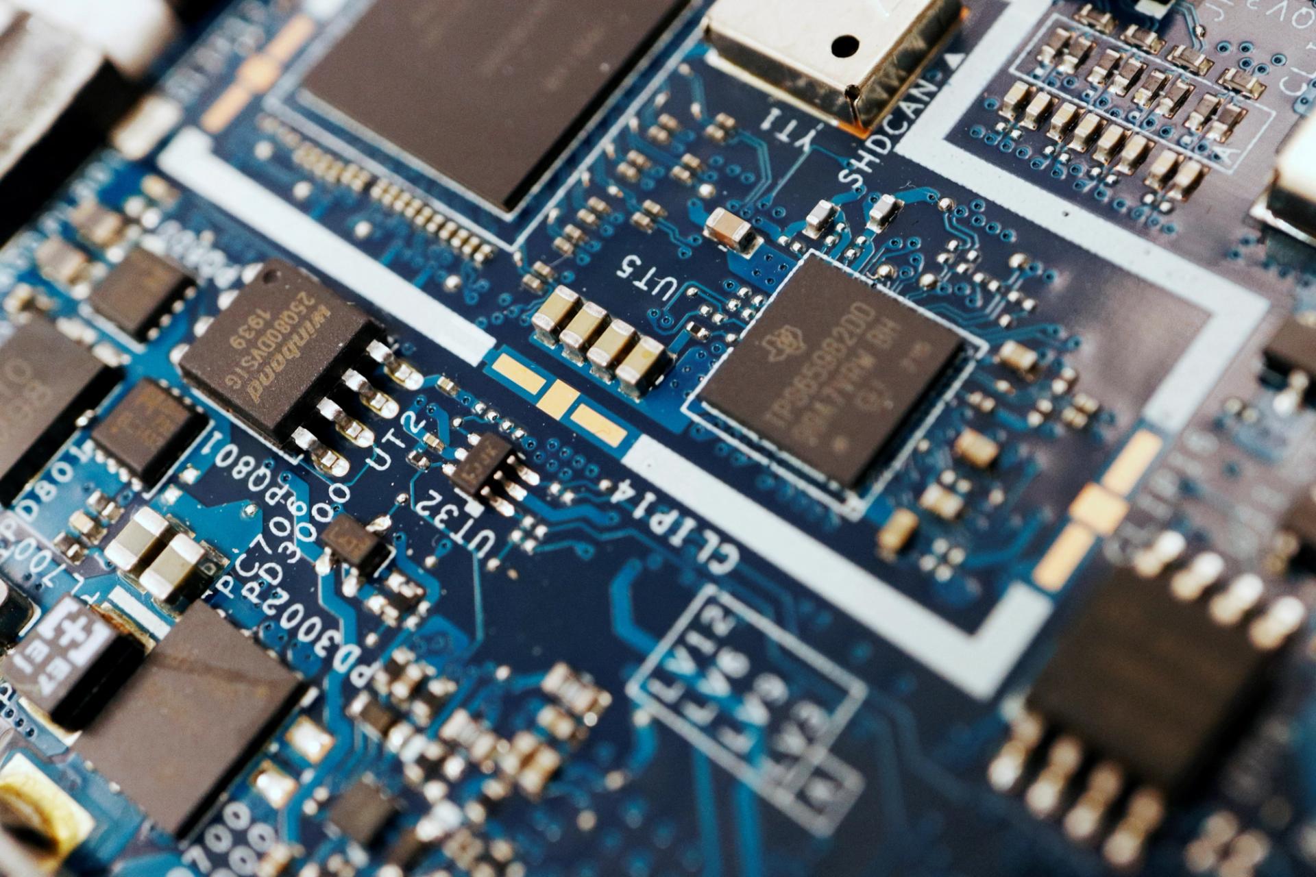 An illustration of semiconductor chips on a circuit board of a computer.