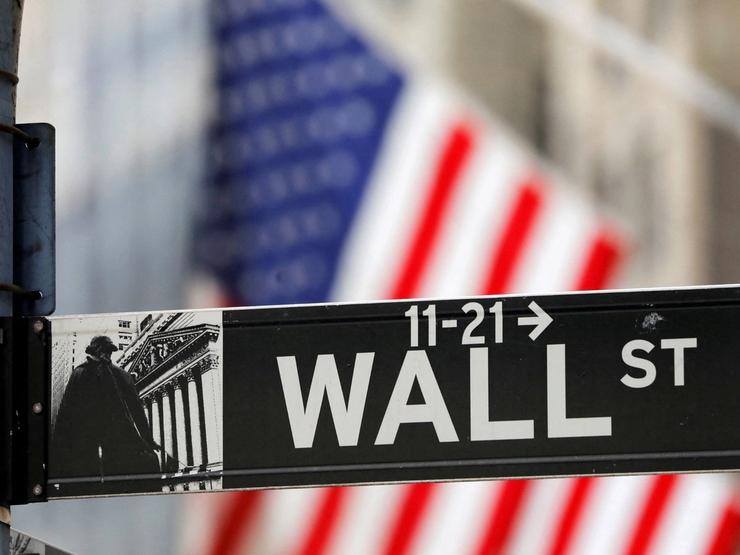 A street sign for Wall Street is seen outside the New York Stock Exchange (NYSE).