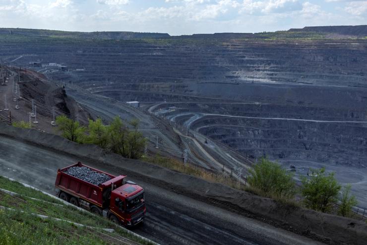 A dump truck drives past the Southern Iron Ore JV open-pit mine, amid Russia’s attack on Ukraine, in Kryvyi Rih, Ukraine April 23, 2025.