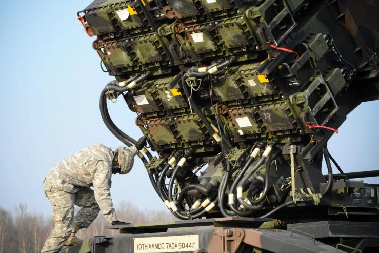 A US soldier inspecting a Patriot missile battery.
