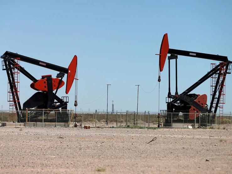 Oil pump jacks are seen at the Vaca Muerta shale oil and gas deposit.