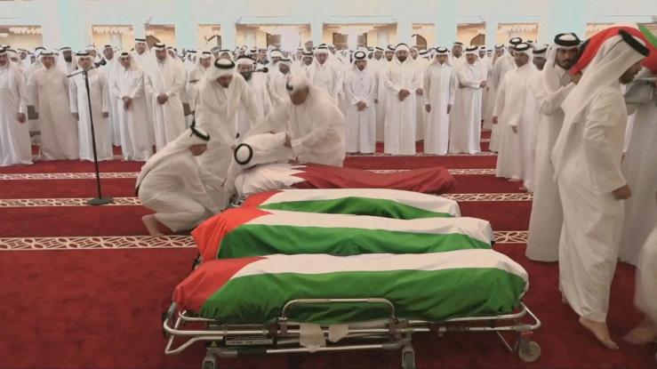 People attend a funeral held for those killed by an Israeli attack in Doha.
