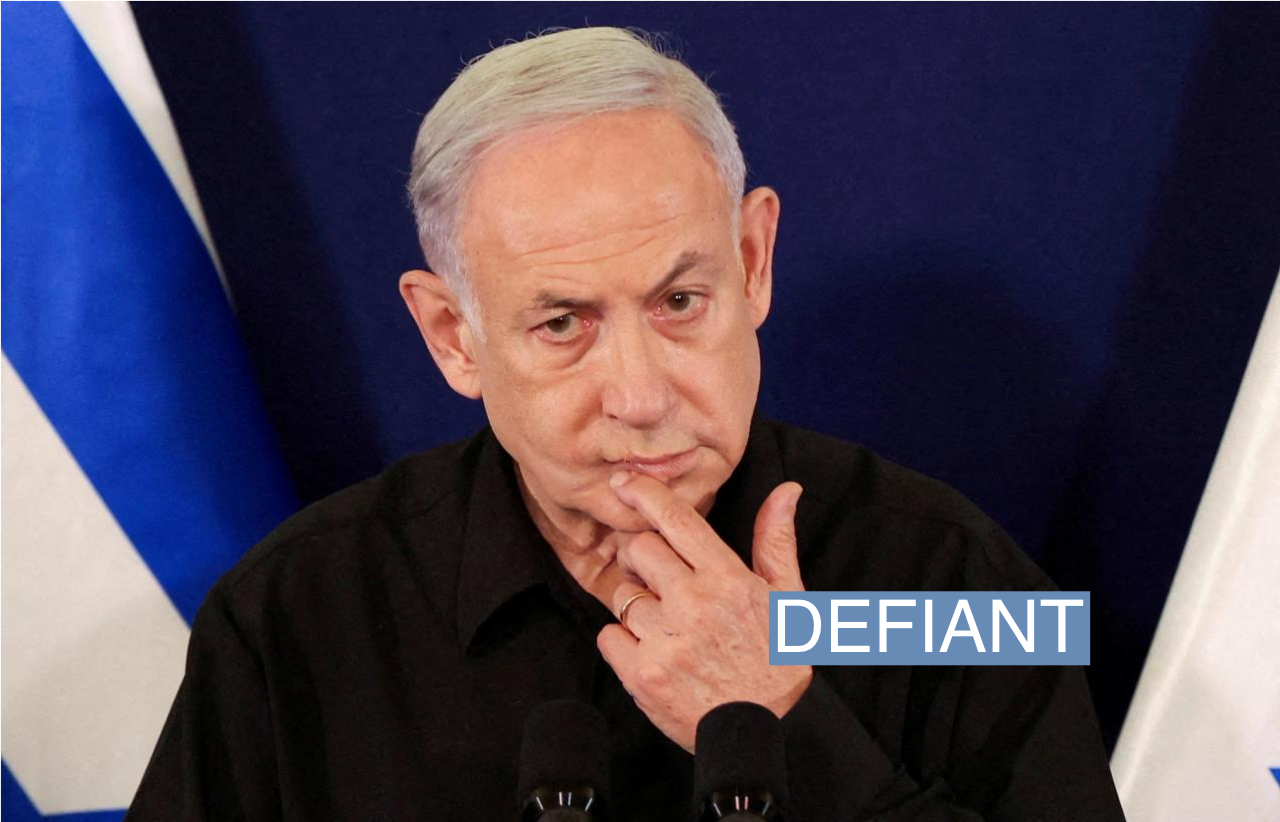 Israeli Prime Minister Benjamin Netanyahu speaks during a press conference with Defense Minister Yoav Gallant and Cabinet Minister Benny Gantz in the Kirya military base in Tel Aviv , Israel , 28 October 2023. ABIR SULTAN POOL/Pool via REUTERS//File Photo