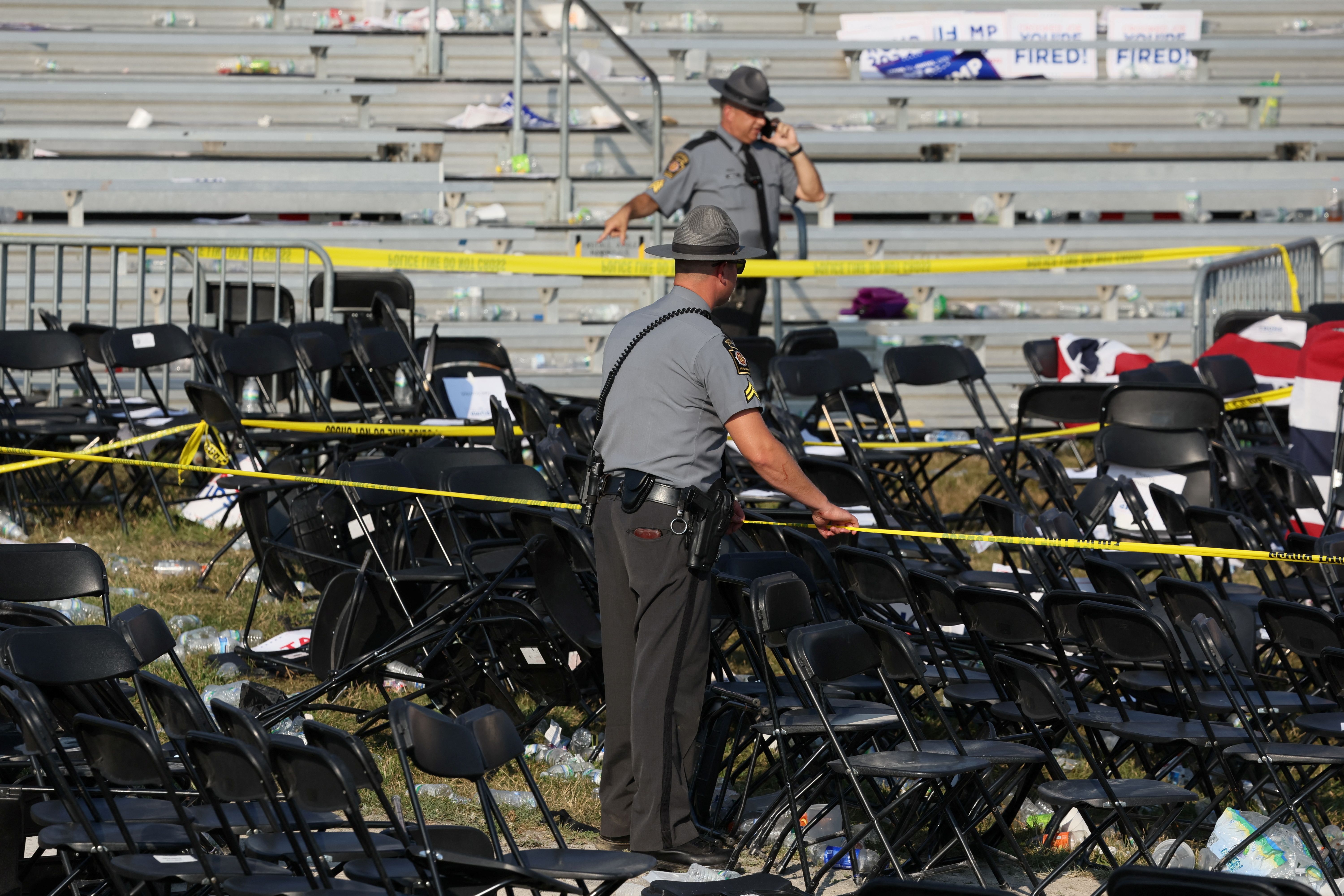 Security personnel put up barricade tape after multiple shots rung out at Republican presidential candidate and former U.S. President Donald Trump’s campaign rally at the Butler Farm Show in Butler, Pennsylvania, U.S., July 13, 2024. 