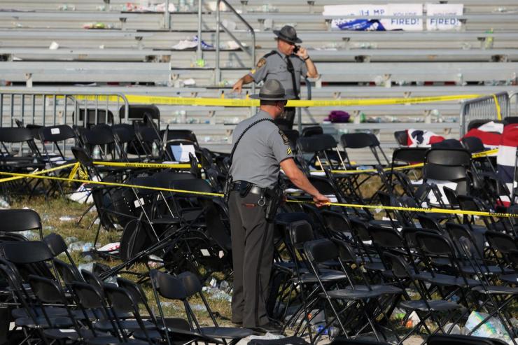 Security personnel put up barricade tape after multiple shots rung out at Republican presidential candidate and former U.S. President Donald Trump’s campaign rally at the Butler Farm Show in Butler, Pennsylvania, U.S., July 13, 2024.