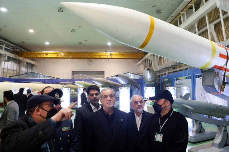 Iran’s president visiting the ministry of defense.