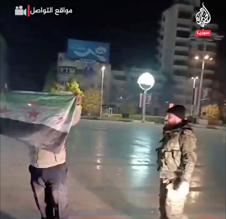 Syria’s rebel flag raised in Aleppo’s central square on Nov 29, 2024.