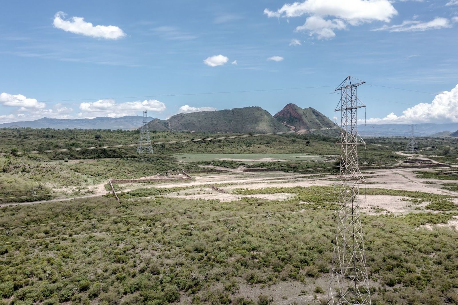  Electricity pylons supporting high-voltage transmission cables run through the Lake Elementaita National Wildlife Sanctuary in Kenya’s Great Rift Valley.