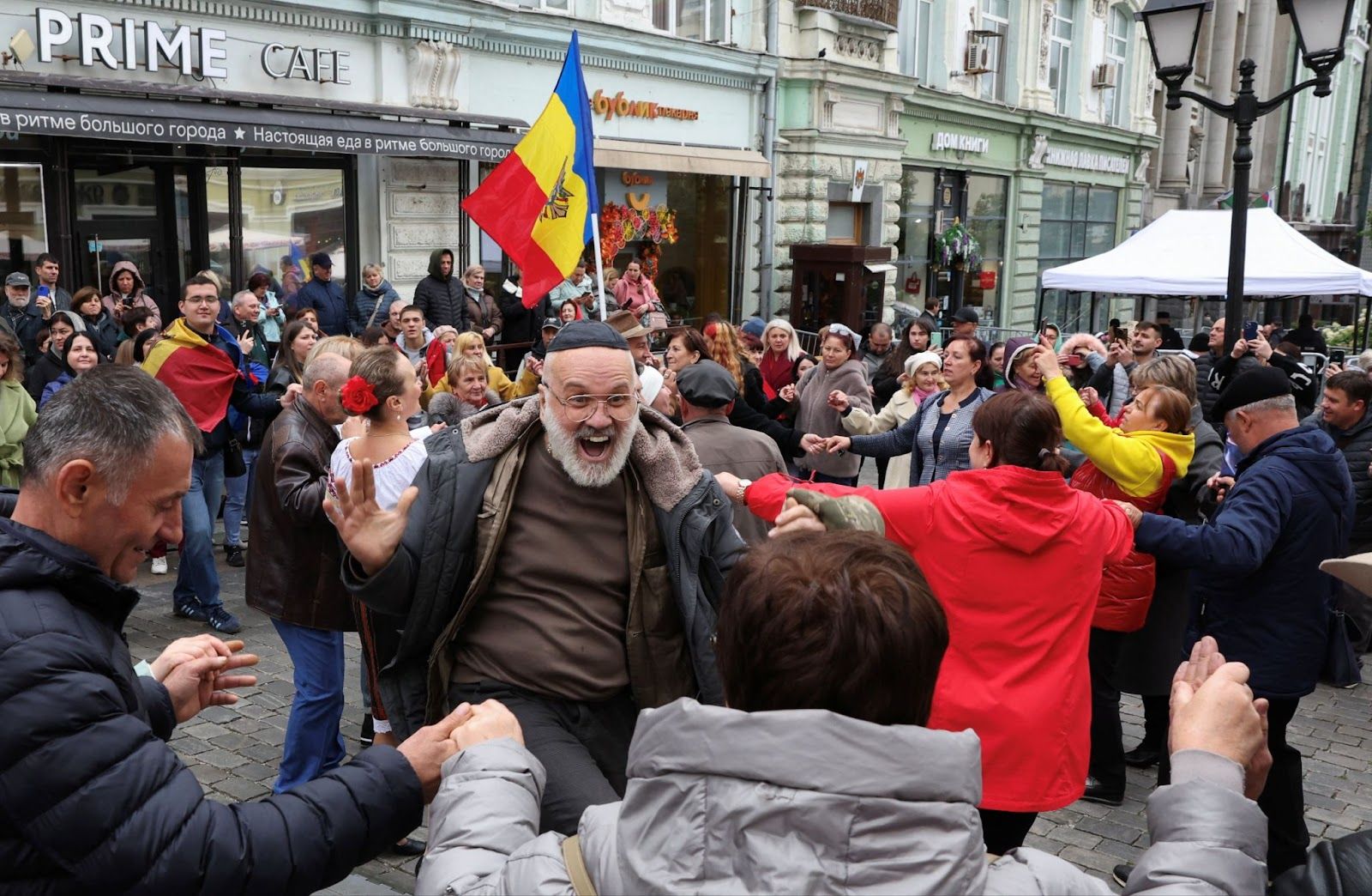 A voter celebrating in Moldova. 