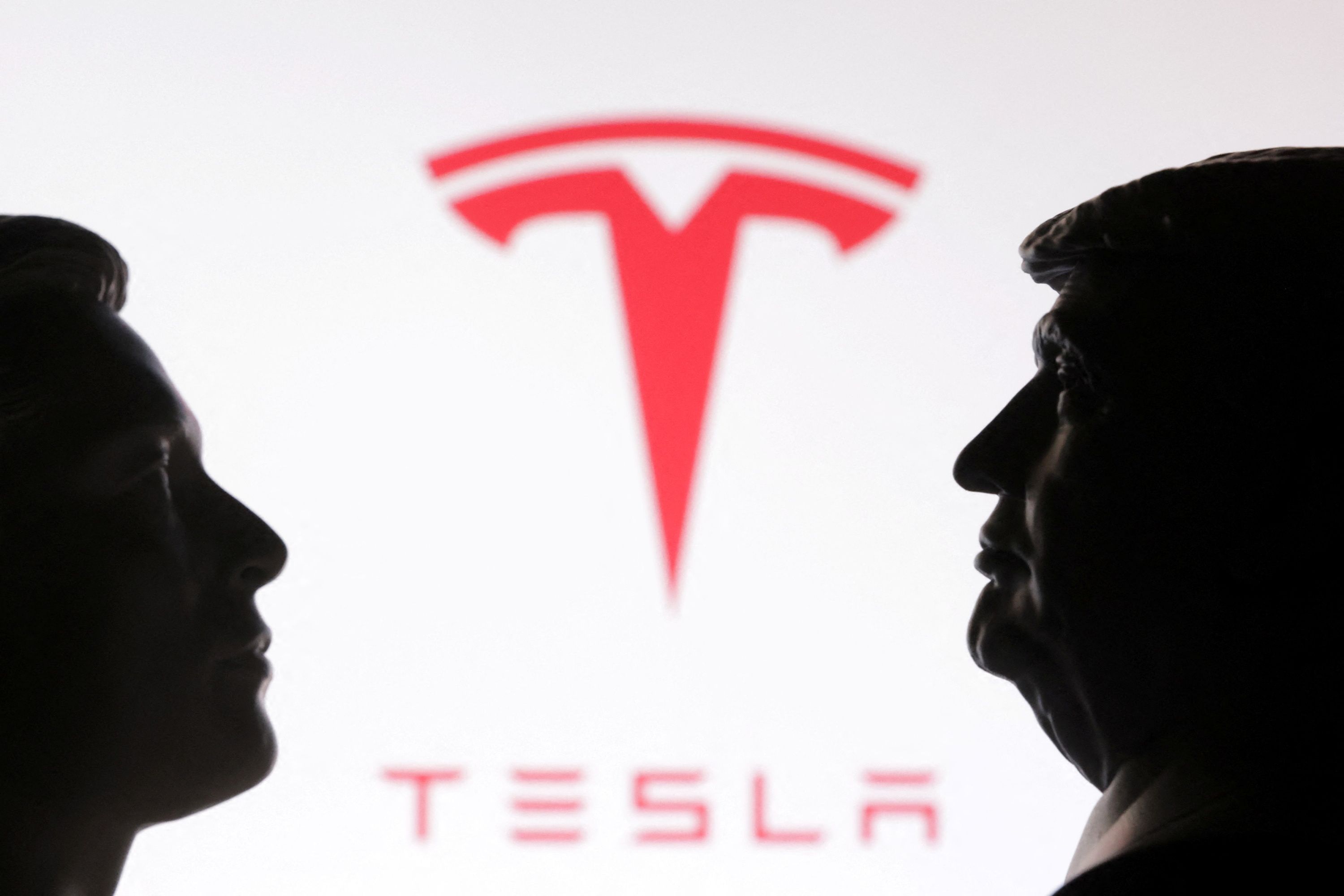 3D printed miniatures of U.S. President Donald Trump and Elon Musk, and Tesla logo