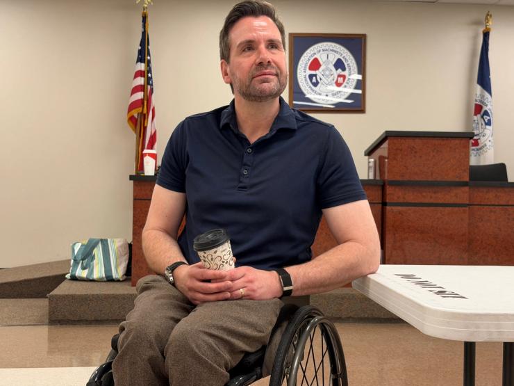 Josh Turek, the Democrat running for Iowa’s open Senate sits after attending a roundtable discussion on healthcare.