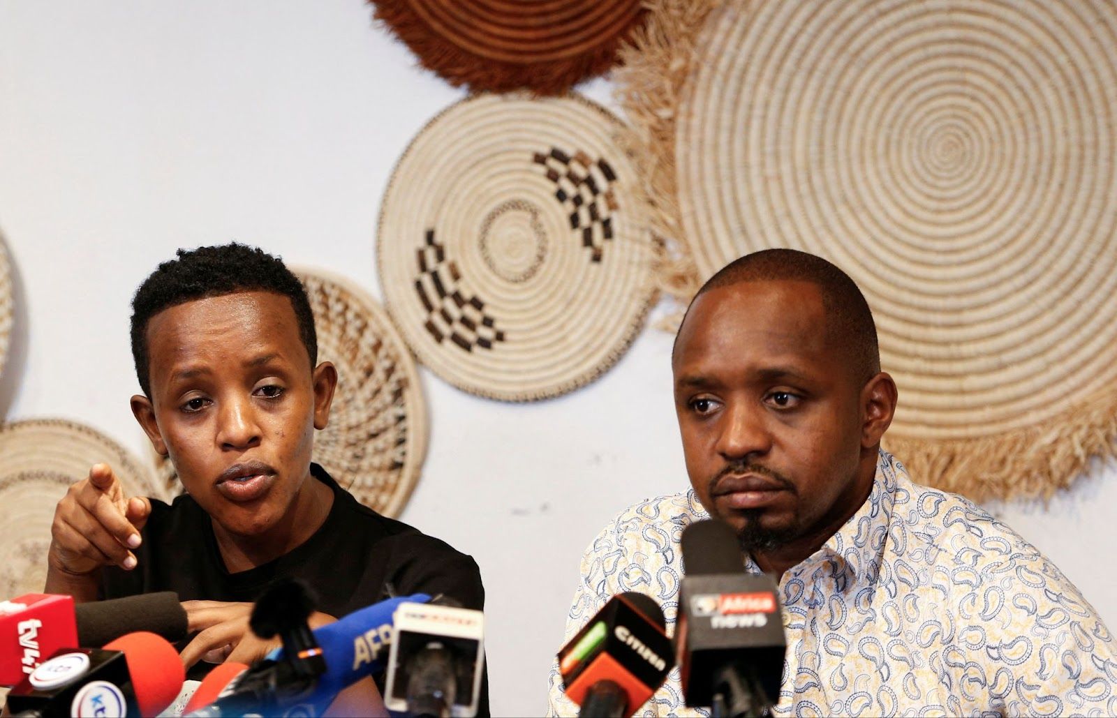 Ugandan activist Agather Atuhaire and Kenyan activist Boniface Mwangi, who were both detained upon their arrival in Dar es Salaam to attend the first court appearance of Tanzanian opposition leader Tundu Lissu, and later released, address a press conference in Nairobi, Kenya. June 2, 2025. 