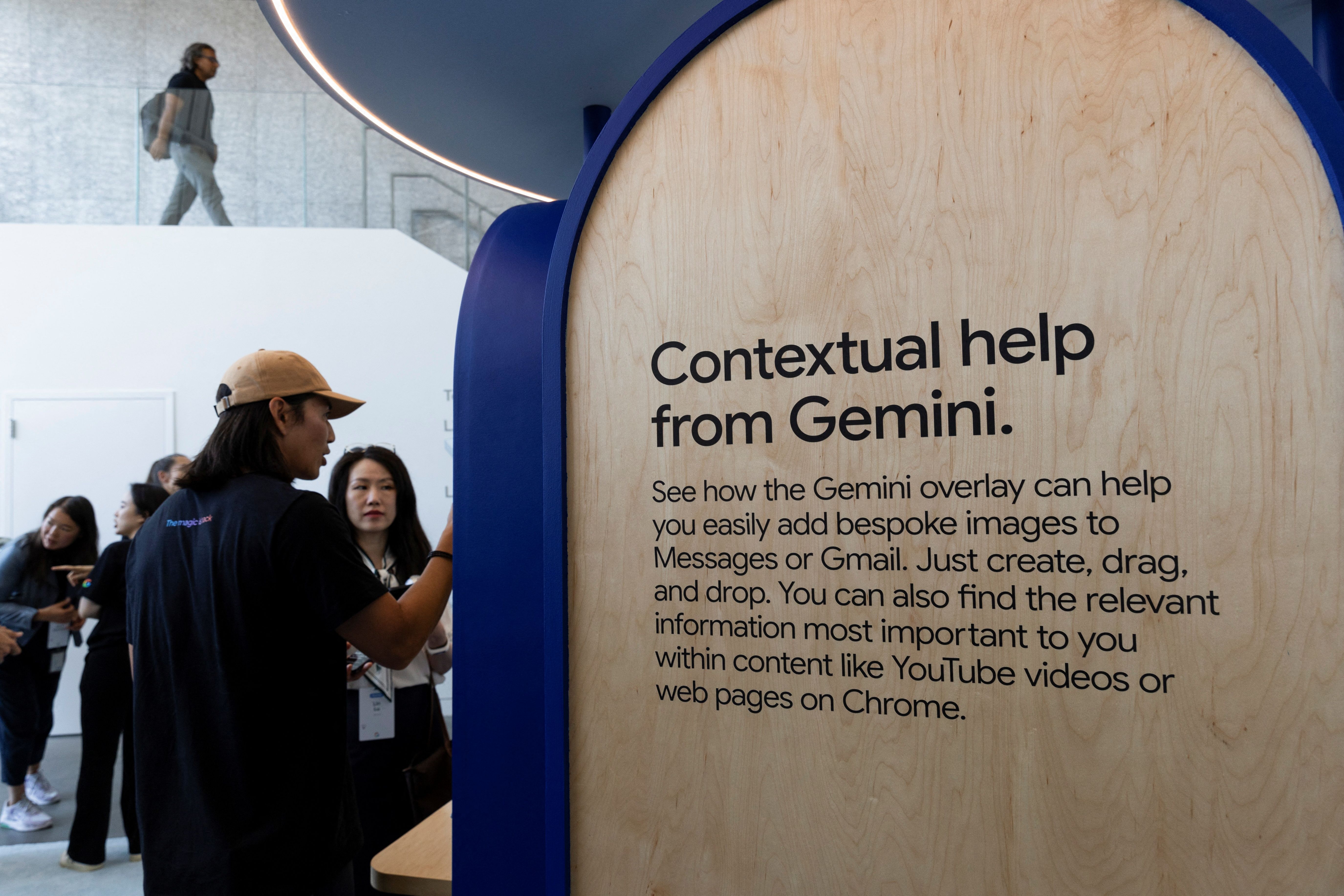 Attendants try the new Gemini AI model features at a Made by Google event in Mountain View