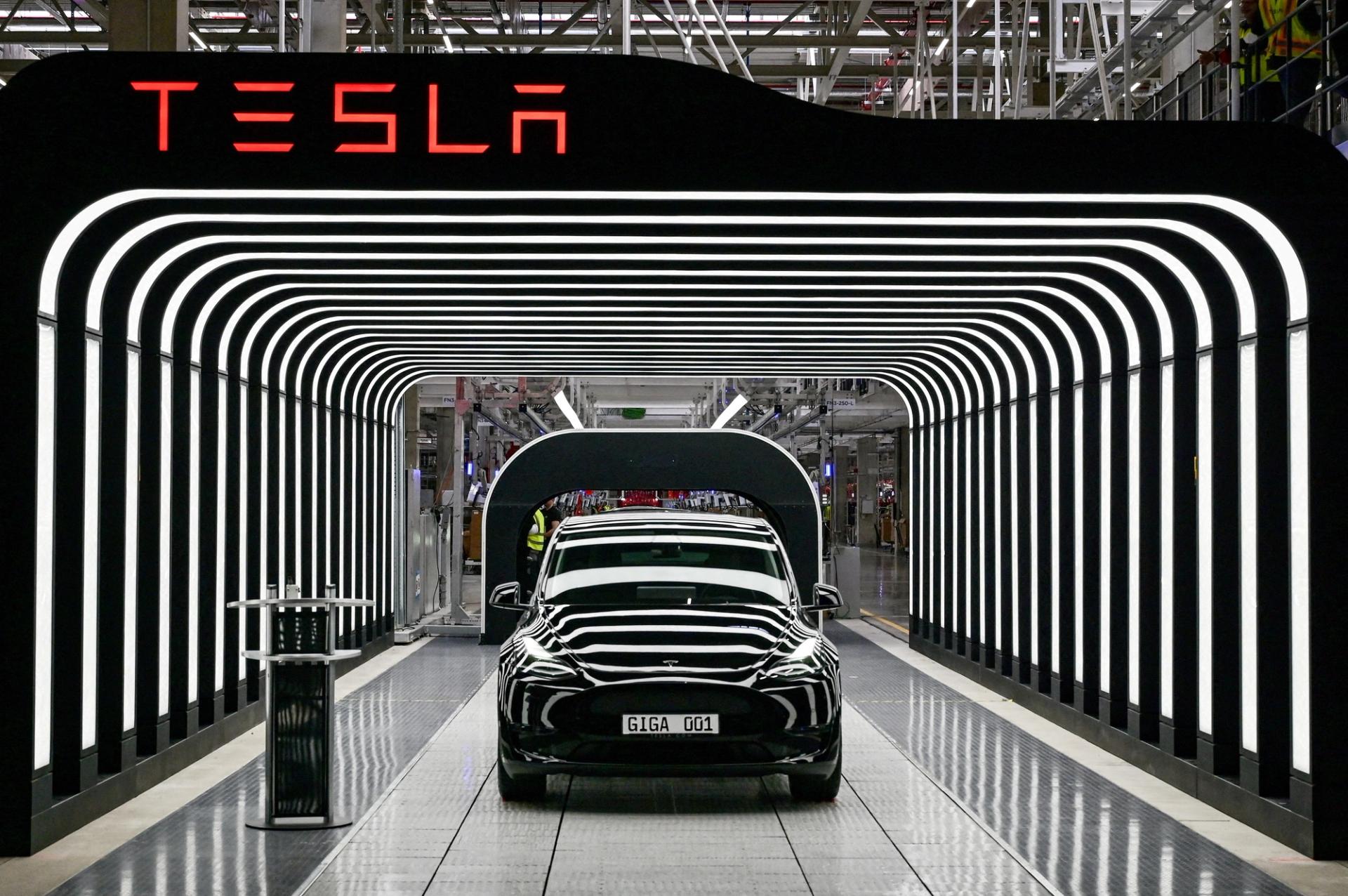 Model Y cars are pictured during the opening ceremony of the new Tesla Gigafactory for electric cars in Gruenheide, Germany 2022.