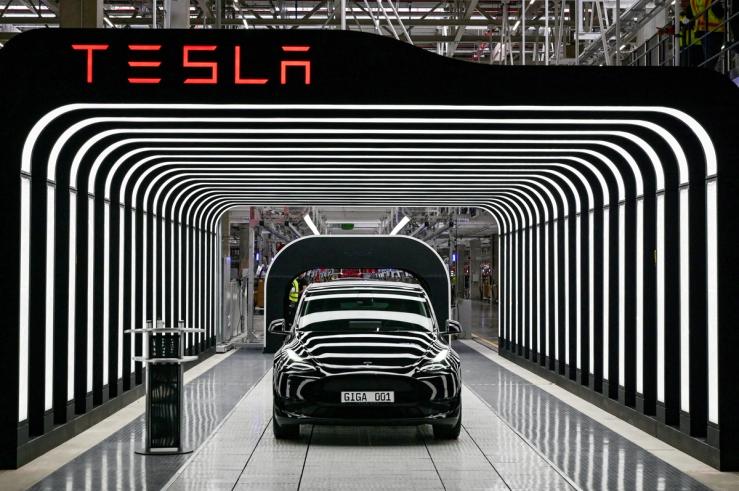 Model Y cars are pictured during the opening ceremony of the new Tesla Gigafactory for electric cars in Gruenheide, Germany 2022.
