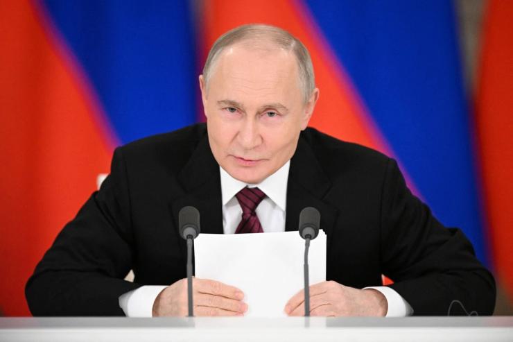 Russian President Vladimir Putin gives a statement to the media.