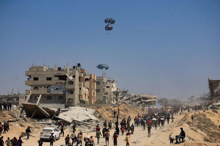 Humanitarian aid is airdropped over Gaza as seen from northern Gaza Strip July 27.