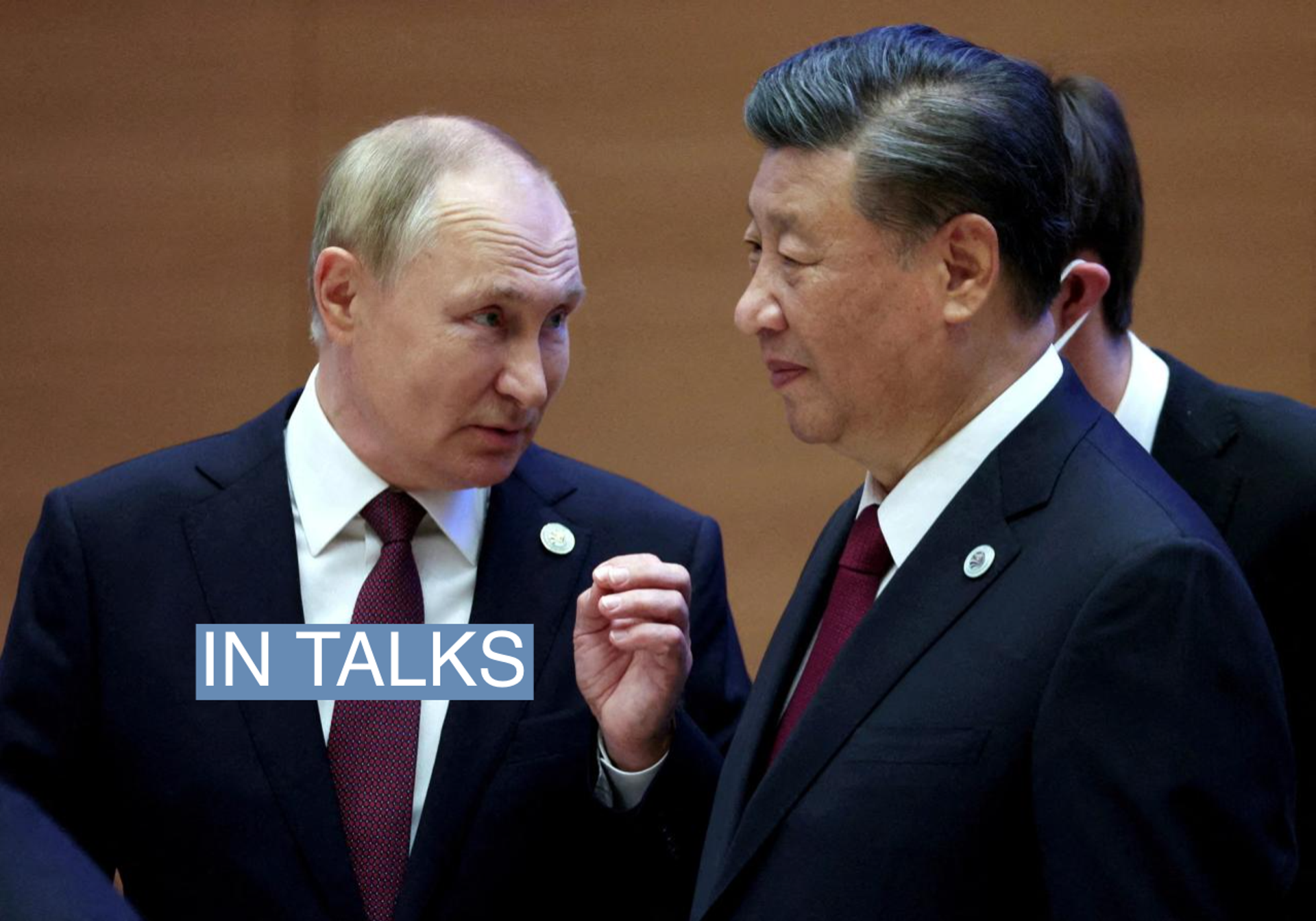 Russian President Vladimir Putin speaks with Chinese President Xi Jinping before an extended-format meeting of heads of the Shanghai Cooperation Organization summit (SCO) member states in Samarkand, Uzbekistan September 16, 2022. Sputnik/Sergey Bobylev/Pool via REUTERS