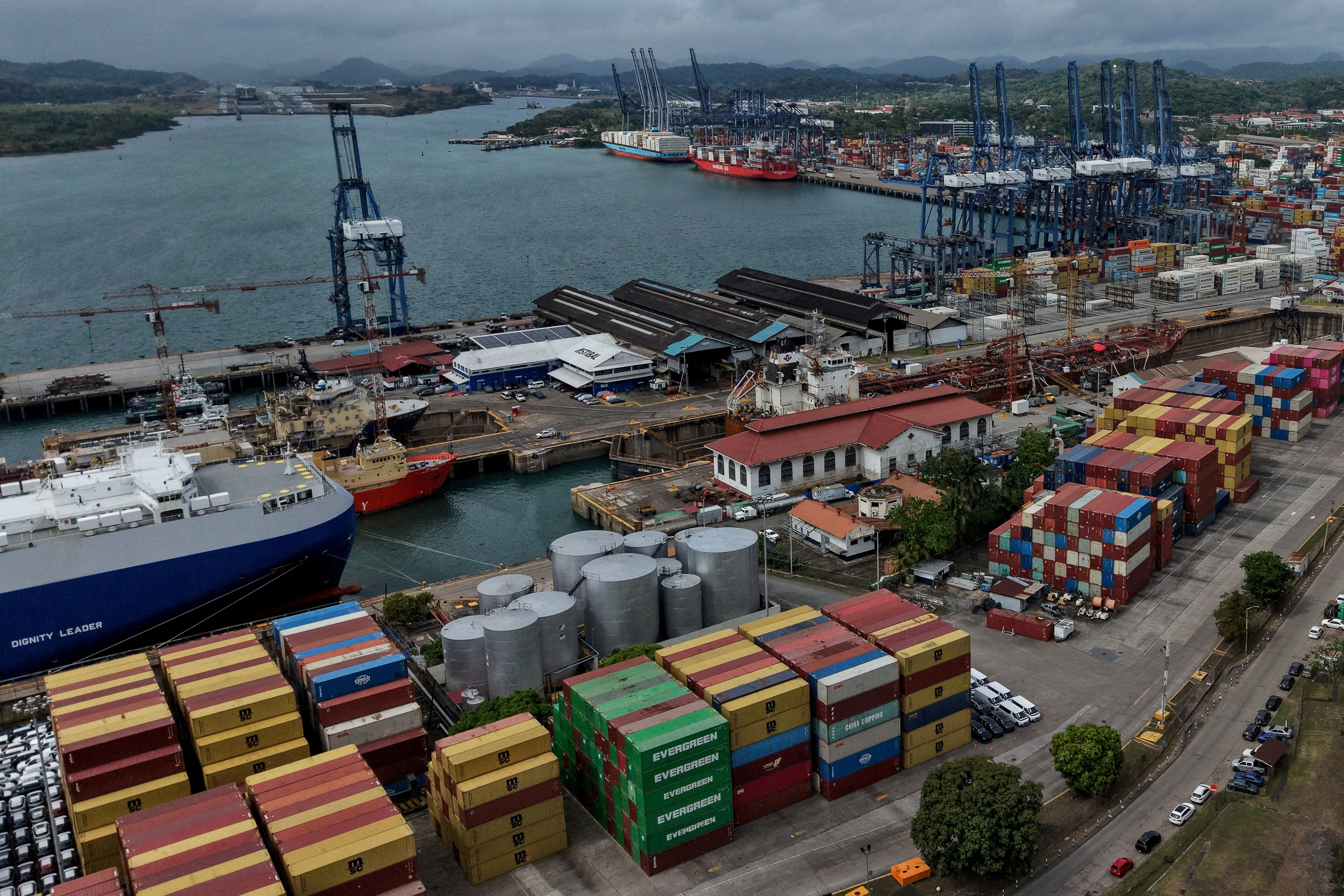 A drone view shows containers docked at Panama Ports Company.