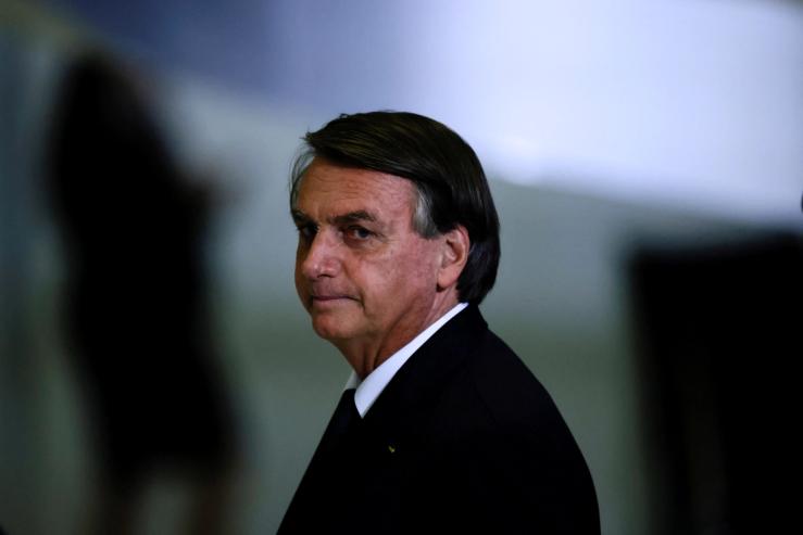 Brazil’s President Jair Bolsonaro looks on after a ceremony about the National Policy for Education at the Planalto Palace in Brasilia, Brazil June 20, 2022.