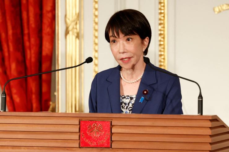 Japanese Prime Minister Sanae Takaichi attends a press conference.