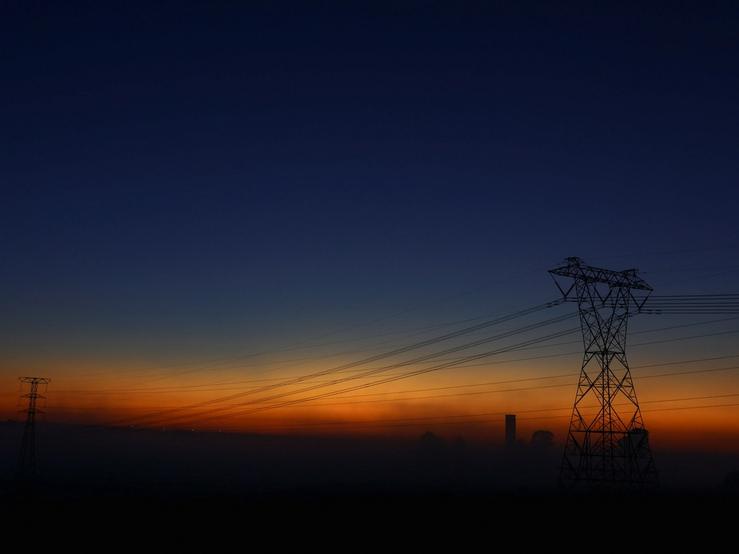 View of South African utility Eskom’s electricity pylons.