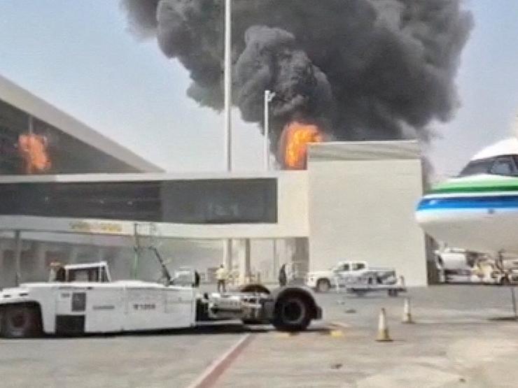 Smoke and flames rise from King Khalid airport after Houthi attack.