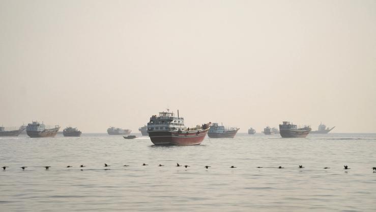 Vessels are anchored in the Strait of Hormuz as seen from Musandam.