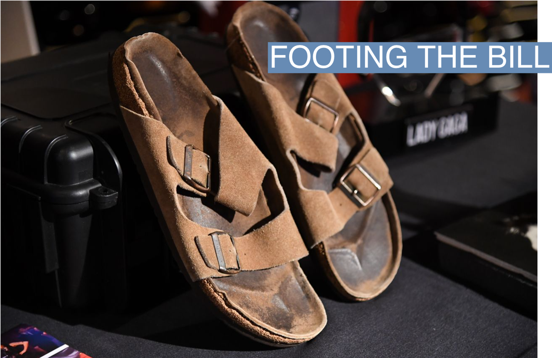 Steve Jobs' personally owned and worn Iconic Birkenstock Sandals (with book and NFT), estimate $60,000 - $80,000 is previewed before auction at the Hard Rock Cafe Times Square in New York, NY