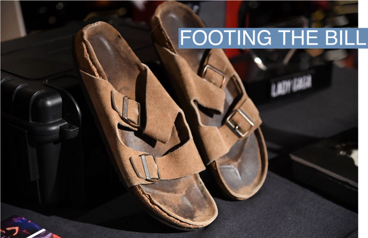 Steve Jobs’ personally owned and worn Iconic Birkenstock Sandals (with book and NFT), estimate $60,000 - $80,000 is previewed before auction at the Hard Rock Cafe Times Square in New York, NY