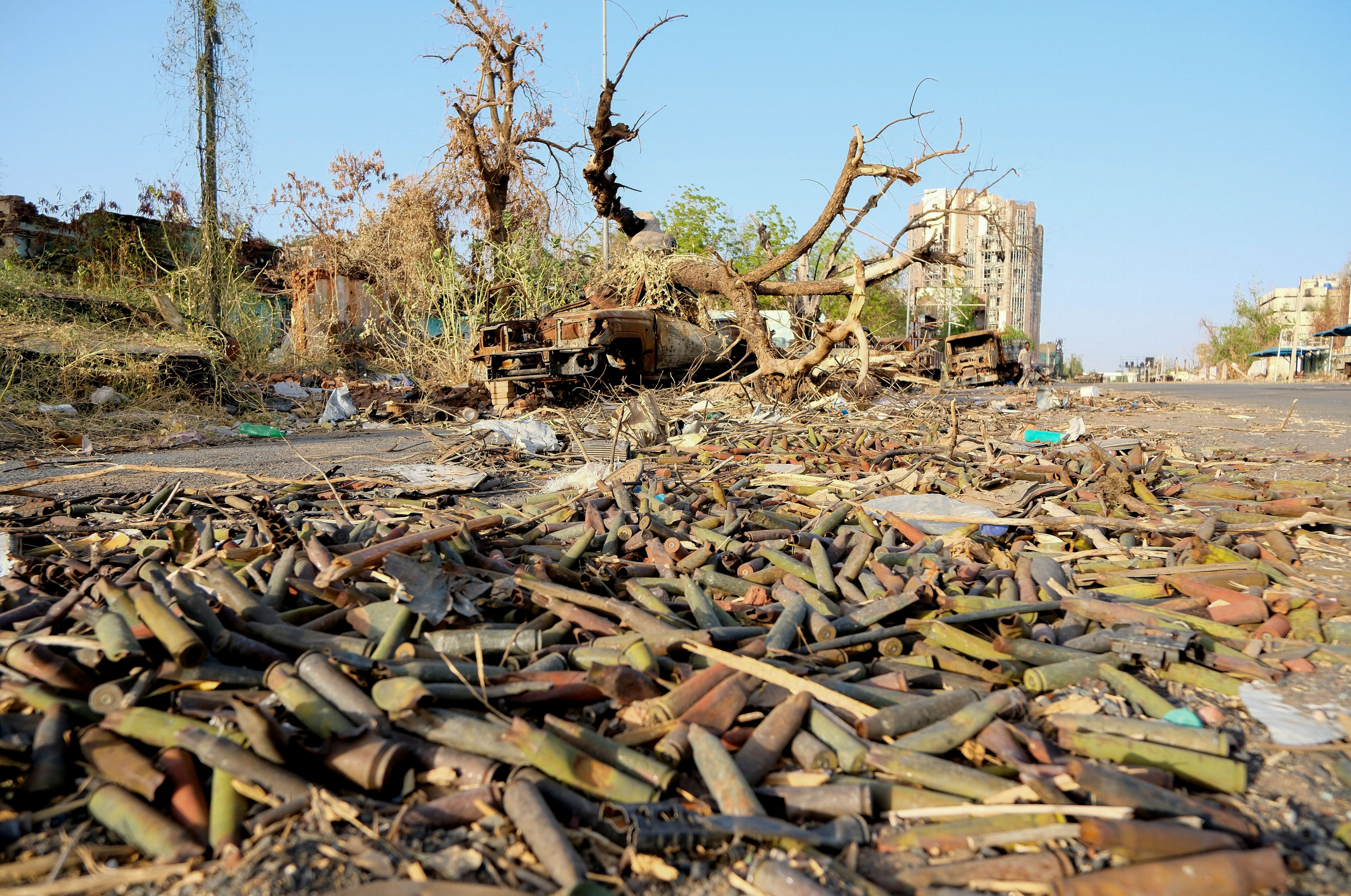 Unexploded ordnance lie on the ground on a street in Khartoum.