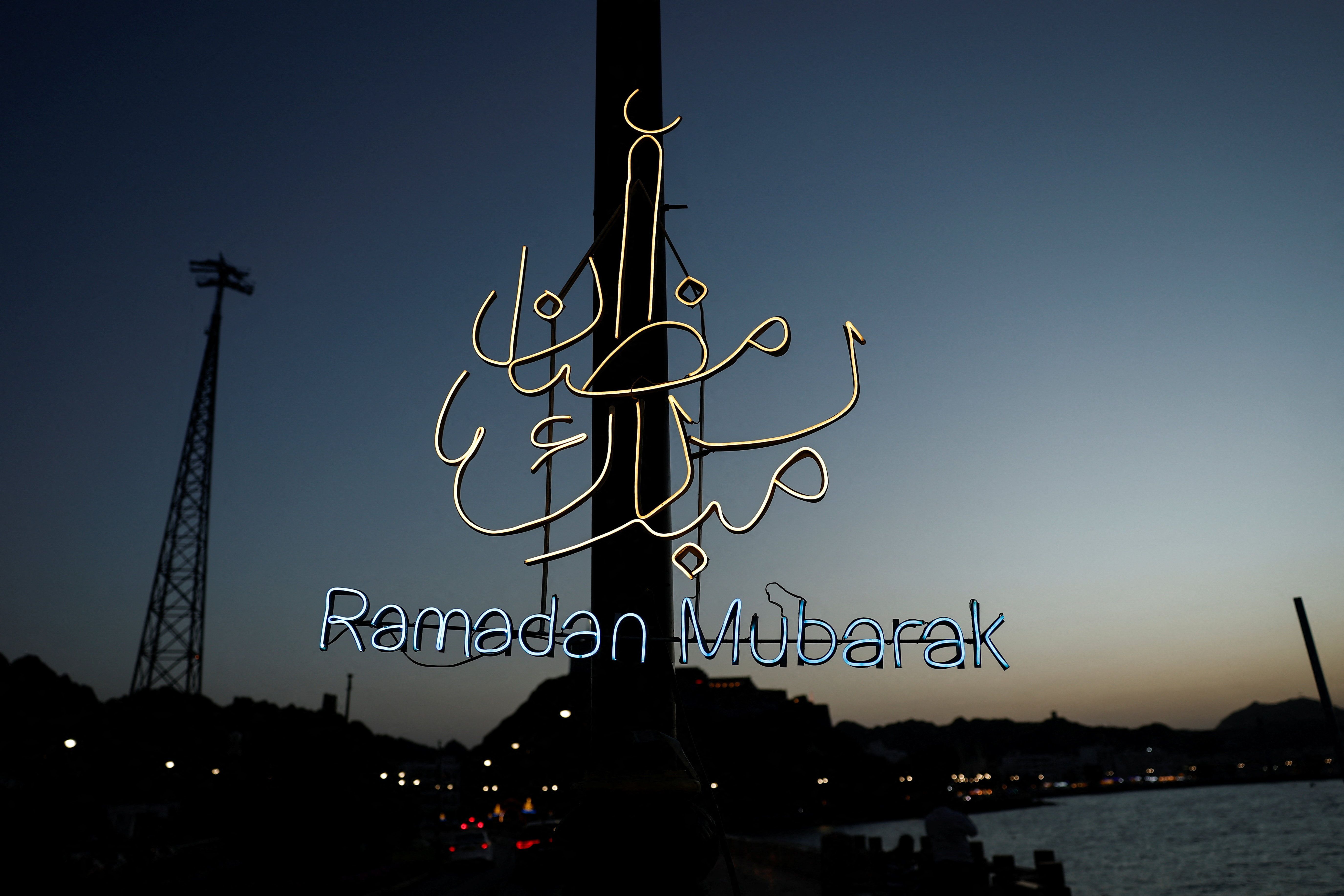 A “Ramadan Mubarak” sign is displayed on the Mutrah Corniche, amid the U.S.-Israeli conflict with Iran, in Muscat, Oman
