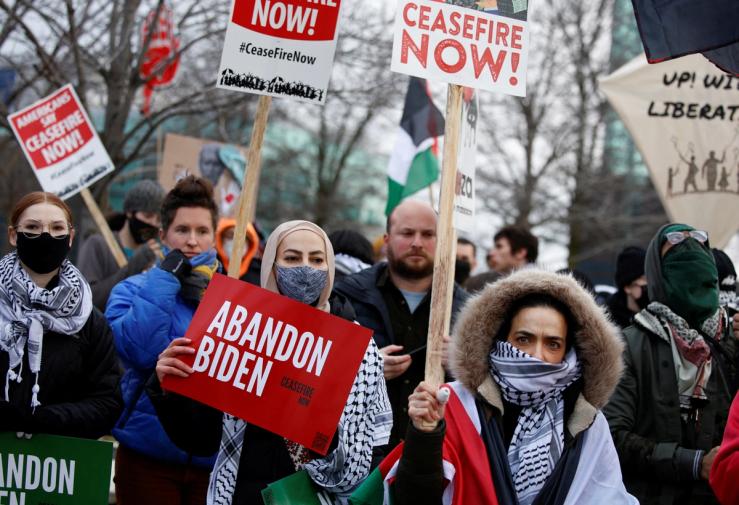 Protesters rally for a cease fire in Gaza outside a UAW union hall during a visit by U.S. President Joe Biden in Warren, Mich., on Feb. 1, 2024.